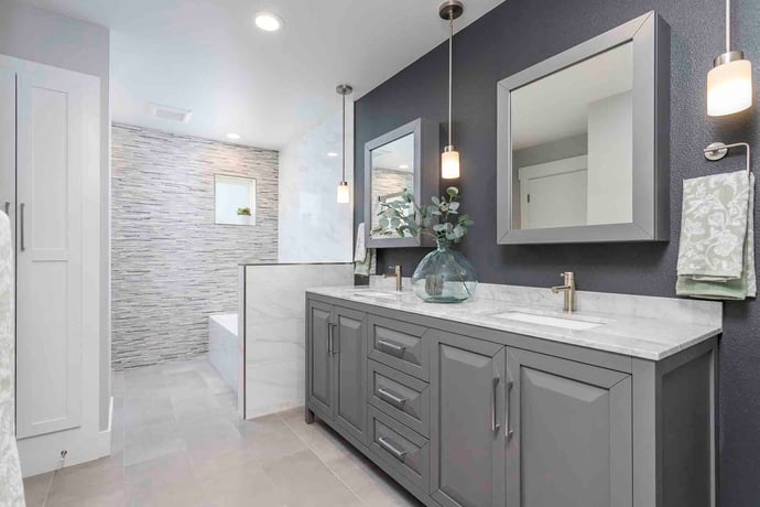 Remodeled bathroom with jack and jill sinks by Creekstone Design + Remodel in Portland, OR