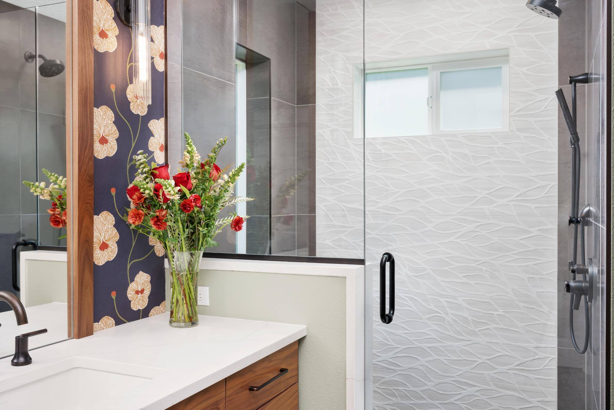 Remodeled bathroom wallpaper and walk-in shower details in Forest Grove, OR by Creekstone Design + Remodel