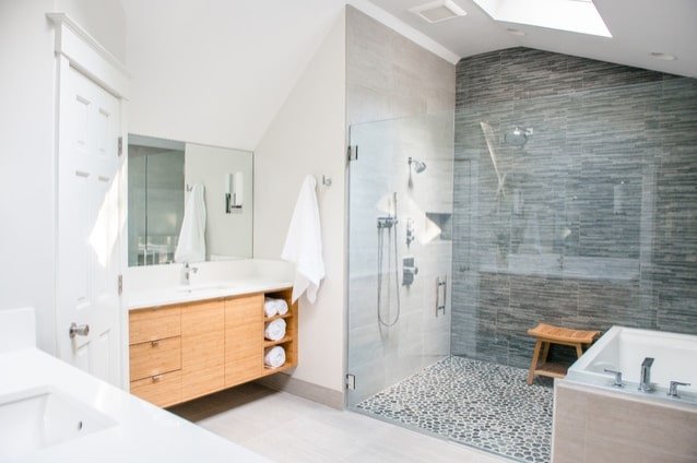 Remodeled Master Bathroom on the Coast of Portland with Walk-in Shower by Creekstone Design + Remodel