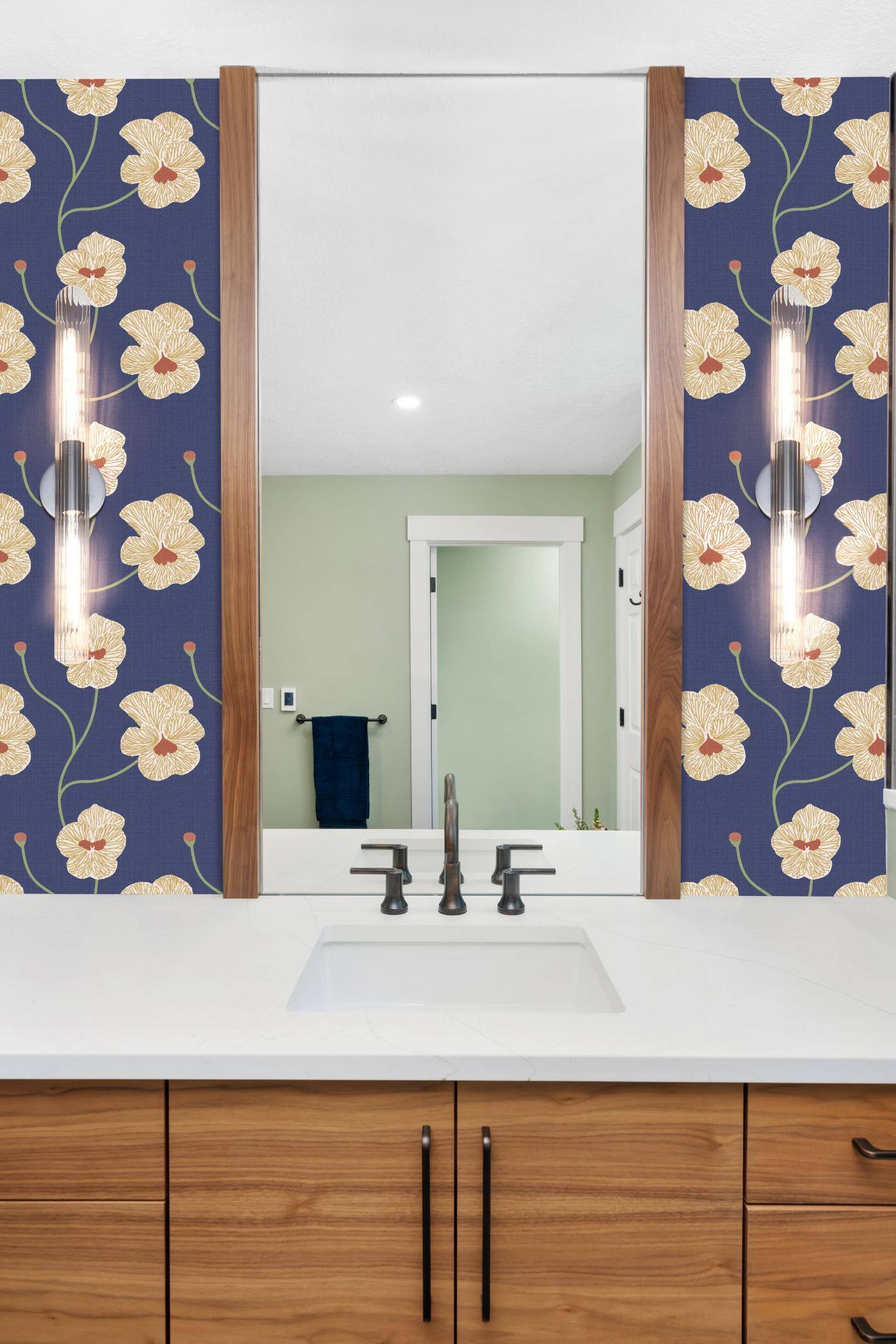 Remodeled bathroom vanity with floral wallpaper in Forest Grove, OR by Creekstone Design + Remodel