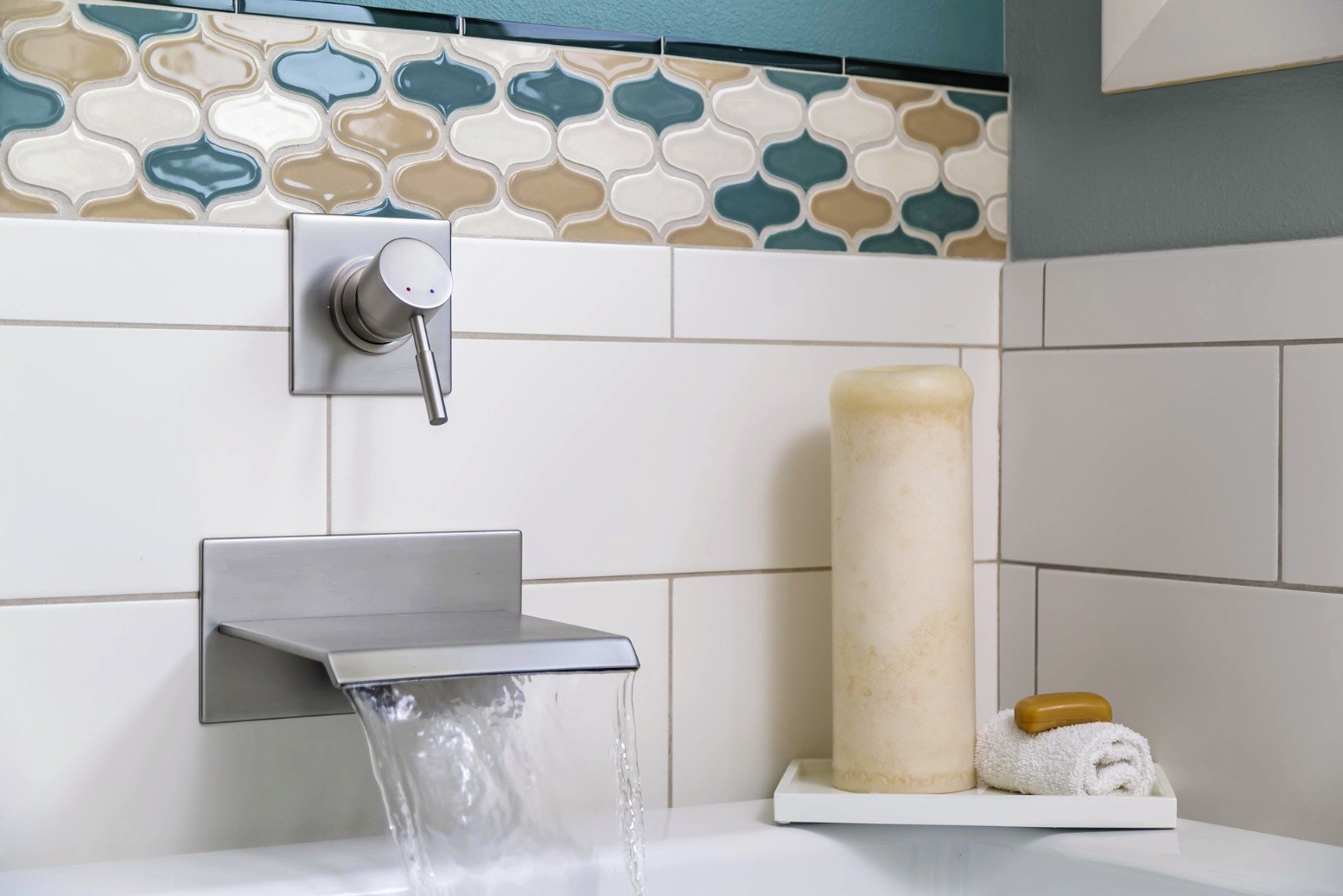 Remodeled bathroom bathtub with tile by Creekstone Design + Remodel