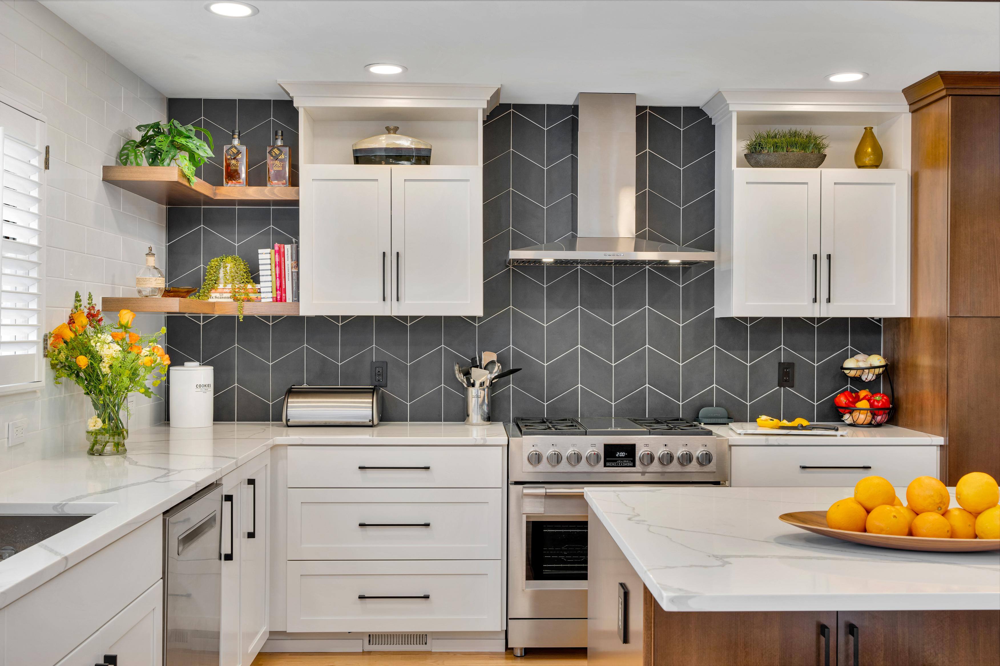 Southwest Hills Kitchen featuring gray patterned backsplash by Creekstone Design + Remodel