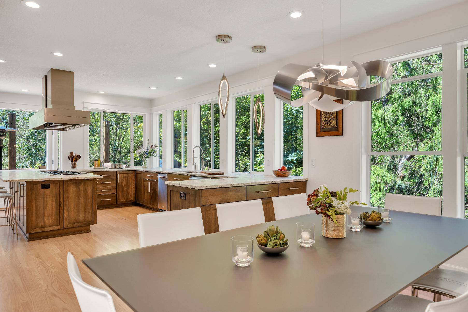 West-Sylvan Kitchen Remodel dining table and kitchen area by Creekstone Design + Remodel