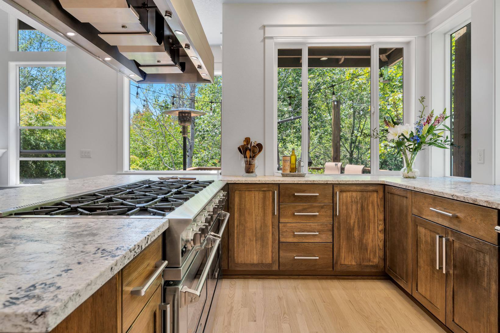 West-Sylvan Kitchen Remodel wrap countertop view of sink area by Creekstone Design + Remodel